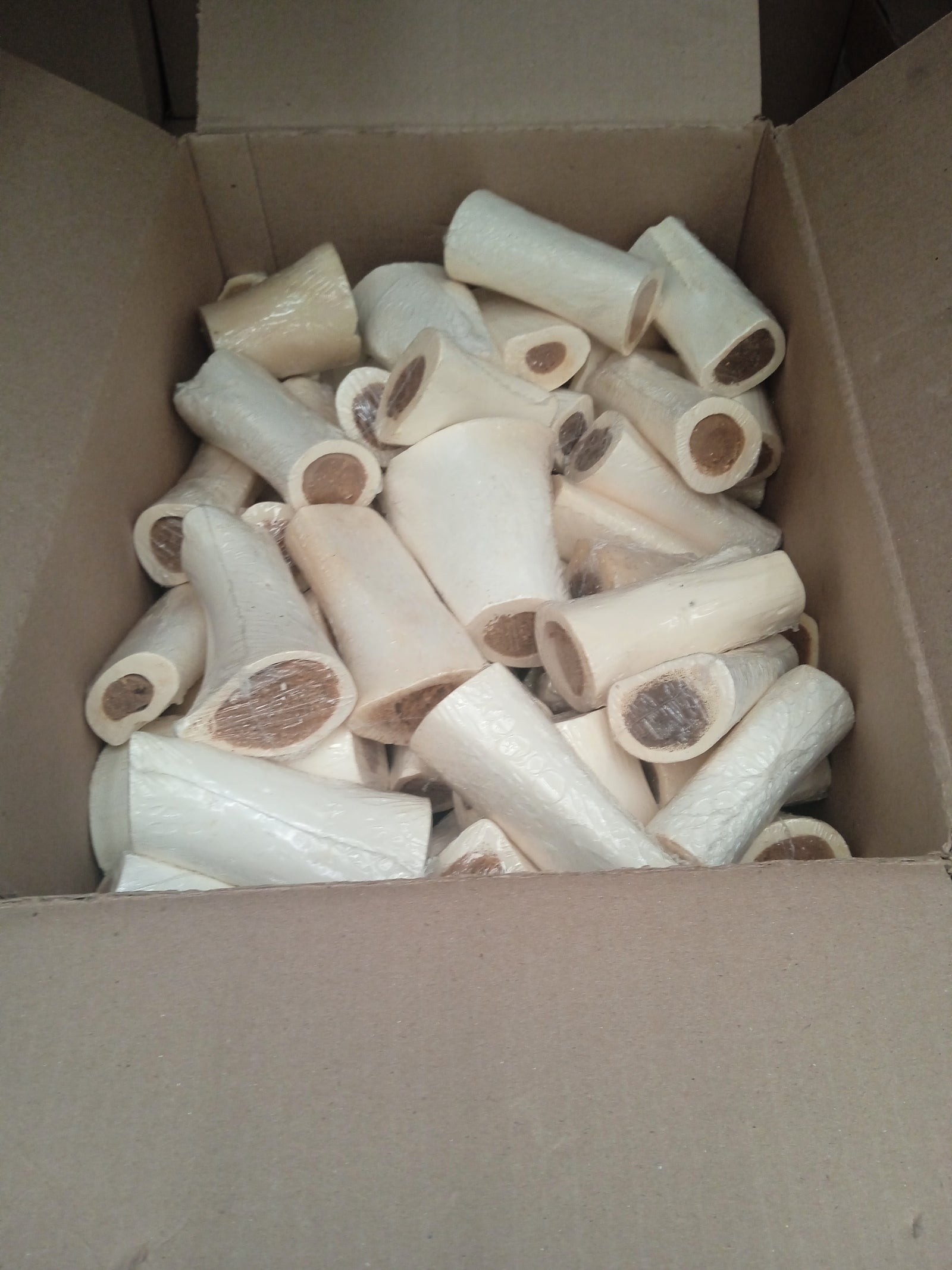 123 Treats Bleached Femur 5-6" Filled With PB — Case of 50